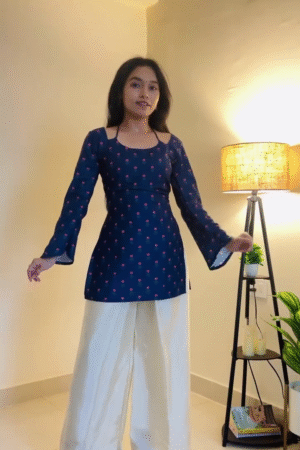 Navy Blue Polka Dot Kurti with Flared Sleeves and White Palazzos