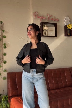 Black Cropped Jacket with Tank Top and Light Blue Jeans – Smart Casual Street Style Look